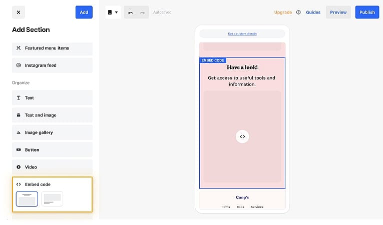 Select the embed code button on Weebly
